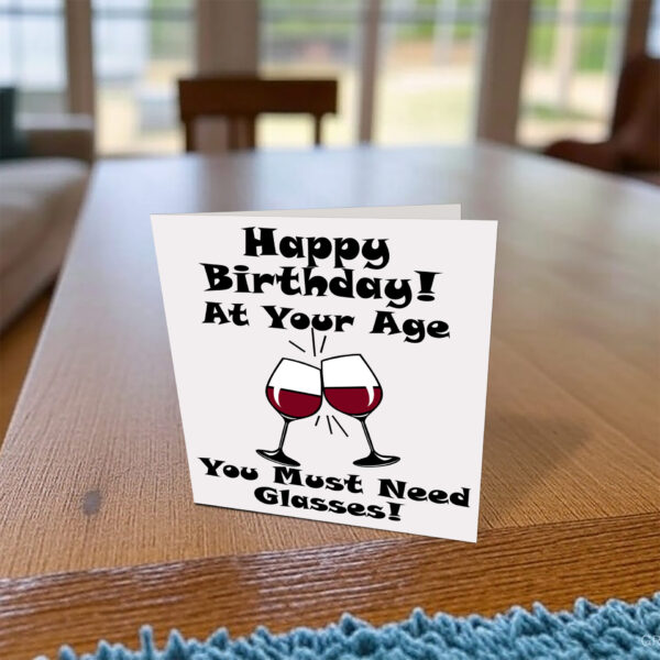 At your age you need glasses Card on desk