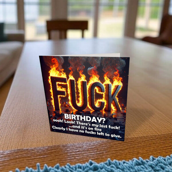 Last Fuck on Fire Card on desk