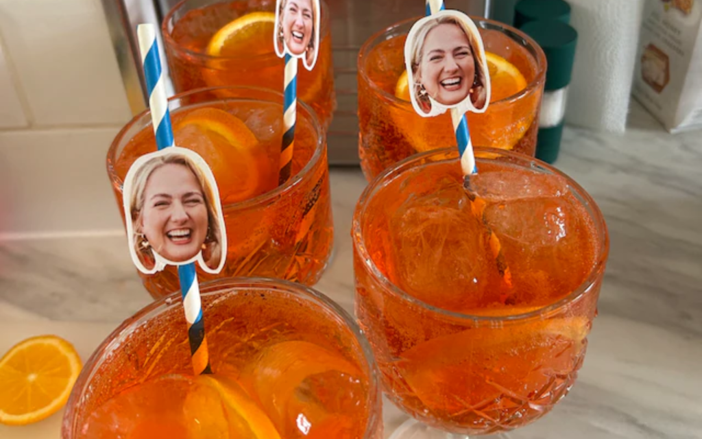 Aperol Spritz with blue personalised straws with smiling faces